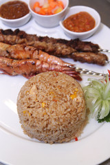 Fried rice eastern cuisine with sate and seafood