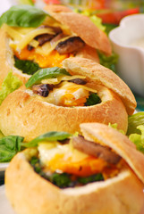 baked buns filled spinach and egg