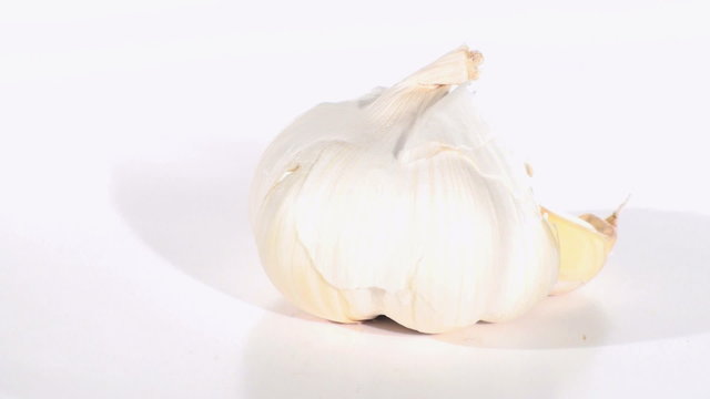 Head of garlic isoalted against white seamless loop - HD