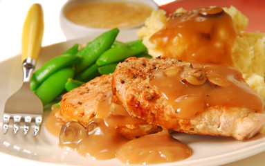 Pork chops with beans and mashed potatoes