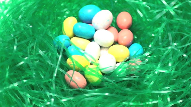 Easter candy in grass seamless loop - HD