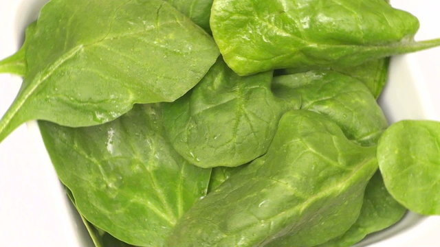Organic spinach in bowl seamless loop - HD