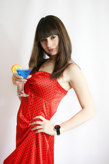 Portrait of young sexy woman with cocktail