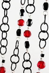 red and black necklace isolated