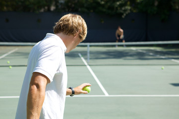 Tennis Player Ready to Serve Ball