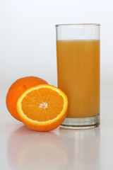A class of fresh orange juice on a white background