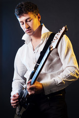 guitarist playing the guitar