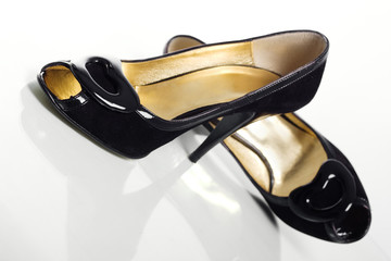 Black elegant shoes on a white background