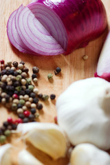 Garlic, onion and spices, different color of pepper