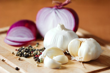 Garlic, onion and spices, different color of pepper