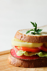 Sandwich with salami in the kitchen