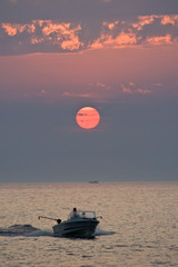 Boat at sunrise