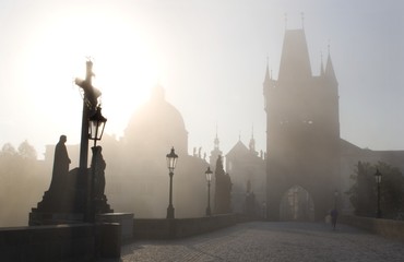 Charles bridge in Prague - morning in fog