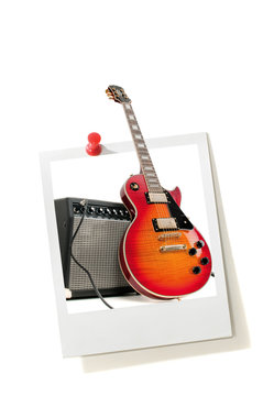 Instant photo print and electric guitar