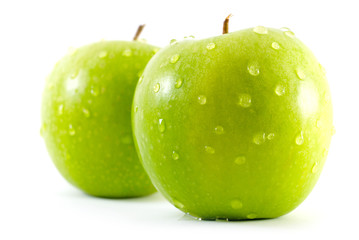 Two fresh green apples