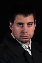 Male portrait isolated on black background