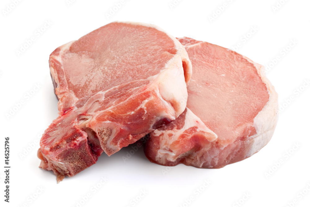 Wall mural raw pork chops on white background