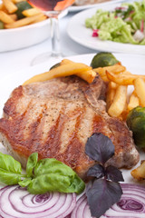pork chops with fries and brussels sprouts