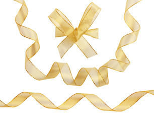 Gold ribbons on white background with clipping path