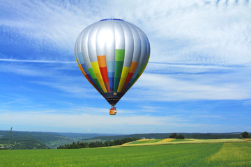 Fototapeta premium Ballon über Feldern