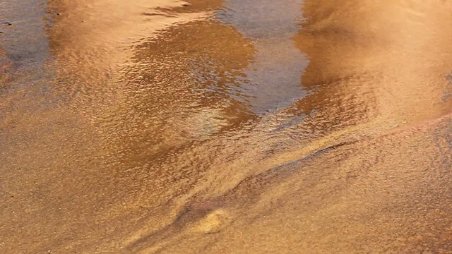 coeur effac&eacute; par les vagues