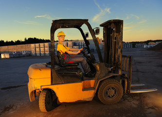 Female worker driving cargo truck