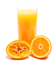 orange and juice in glass