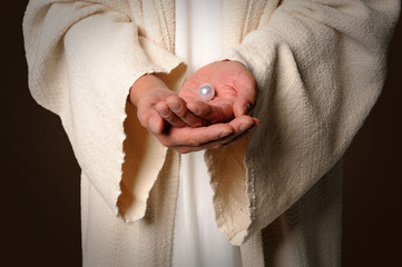 The Hands of Jesus Holding Pearl