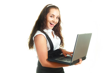Naklejka premium excited girl holding a laptop