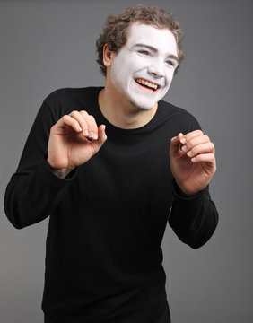 Portrait Of The Mime Isolated On Grey Background