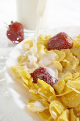cereals with milk and strawberries