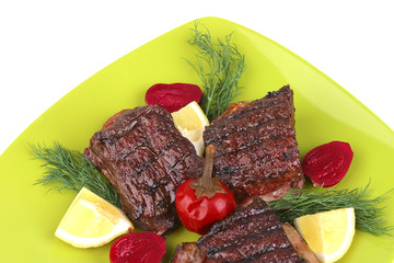 roast rib's on green dish