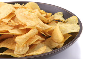 fried chips on dish over white