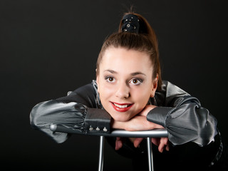 Portrait of smiling girl with lean on hers arm