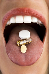 woman taking pills