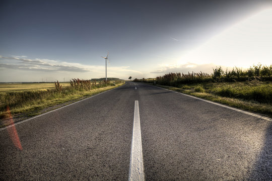 Country Asphalt Road In Strong Flare