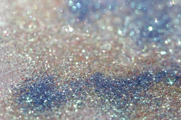 abstract colorful background from glitter dust