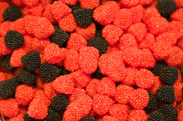 Red and black candies background texture