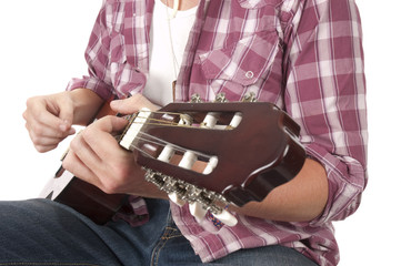 Guitarist playing in closeup