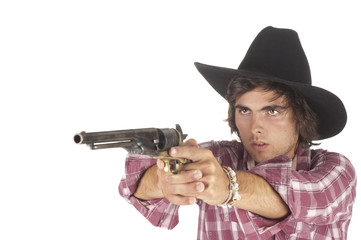 young cowboy with drawn pistol