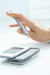 Fototapeta premium Female hand holding pen