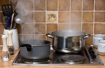 Pans boiling in a kitchen