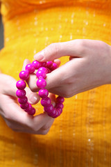 Beads in hand