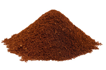 ground coffee beans in a  pile  isolated white background