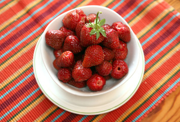 red nice strawberry on saucer