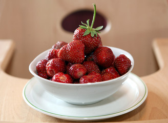 red nice strawberry on saucer