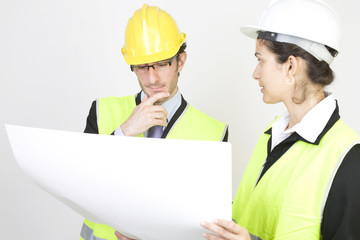 Engineer and client looking on site looking on a project