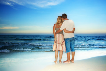 Loving couple near the ocean