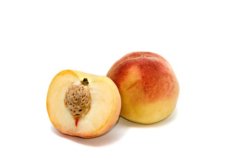 Peach and its section  isolated on white background