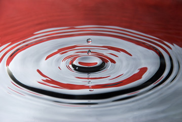 Water droplet against an Indonesian flag